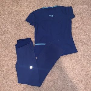 Buttersoft scrubs in Galaxy Blue, yoga pant waist line XS top and XS bottoms